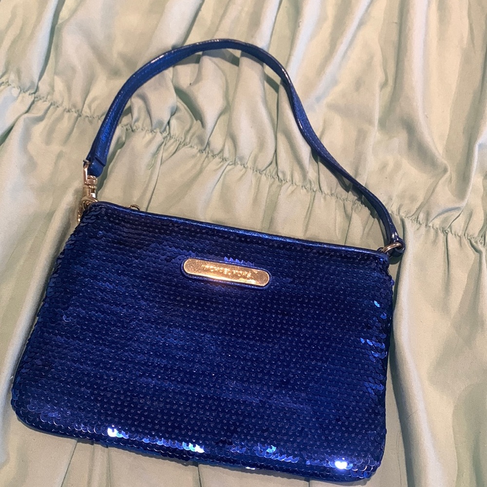 Michael Kors sparkly wristlet with wallet compartments. Excellent condition